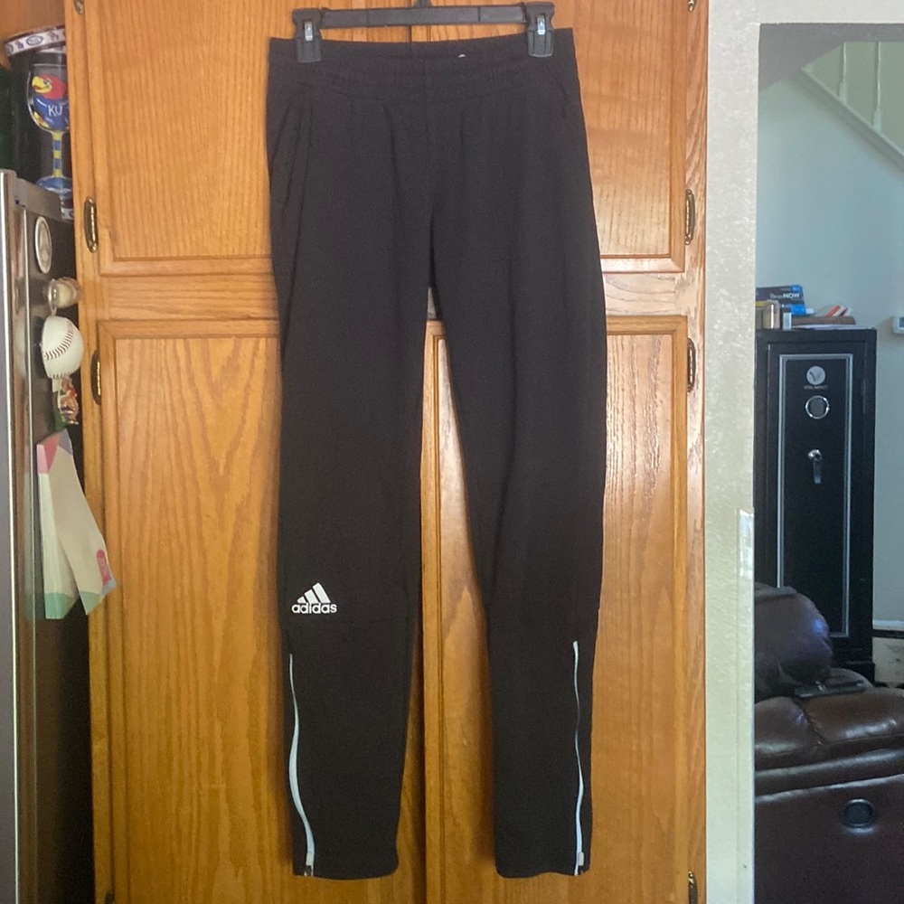 Womens Adidas black Climalite warm up pants.  Zipper bottom.  Size S